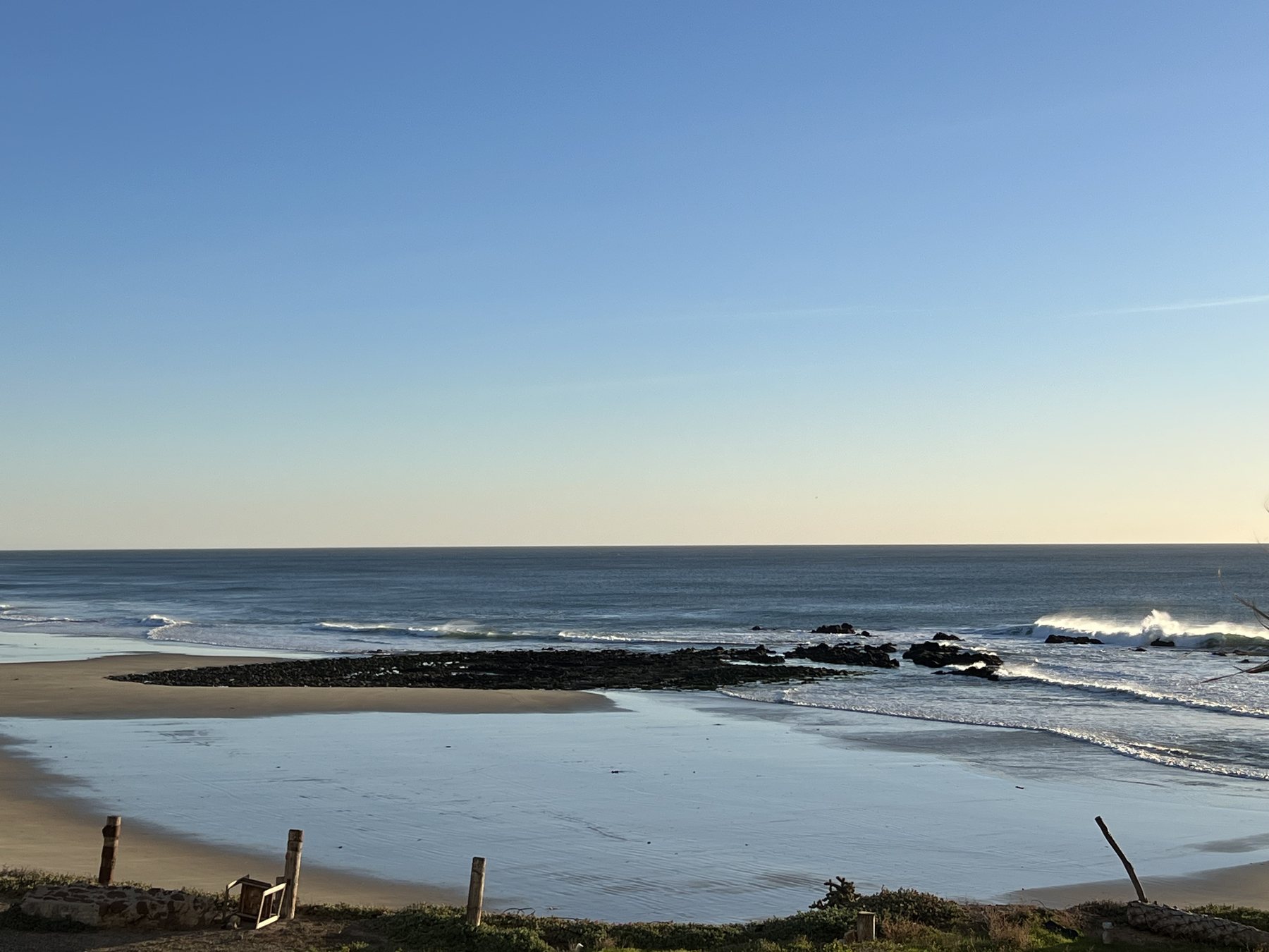 Pacific Ocean beach beside Las Palmas oceanfront condominiums in Rosarito Beach Mexico
