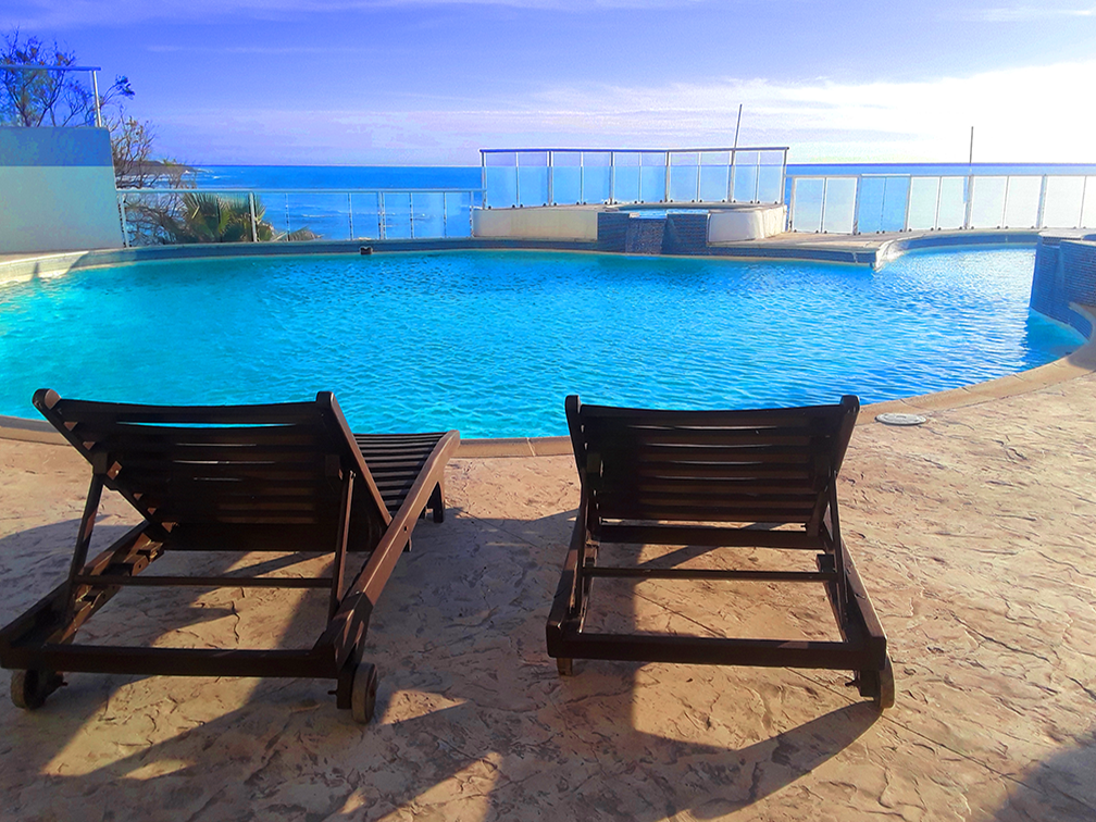 Oceanfront pool and Jacuzzi relaxation area at Las Palmas in Rosarito Baja California Mexico