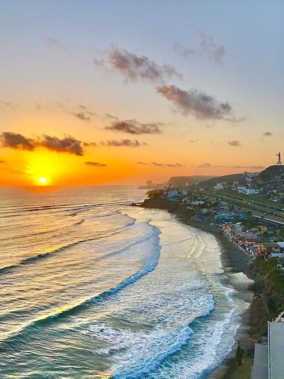 Everyday life in Rosarito Baja California with local streets palm trees and the Pacific coast